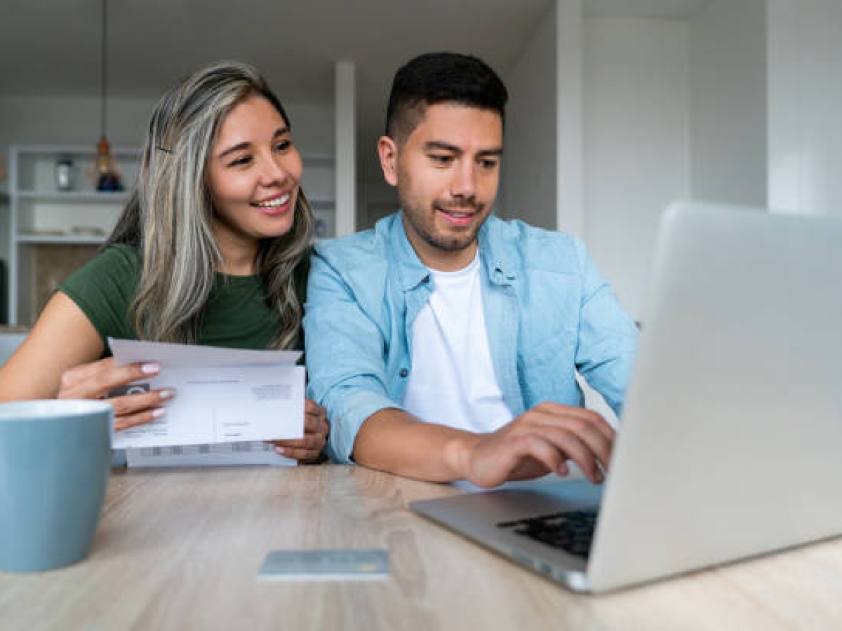 Couple looking at laptop